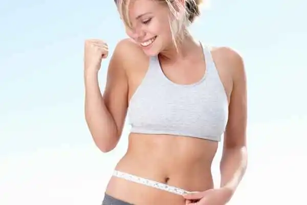 woman happy after fat reduction treatment Shepherd's Bush