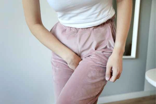 older woman running to the toilet because of urinary incontinence Shepherd's Bush